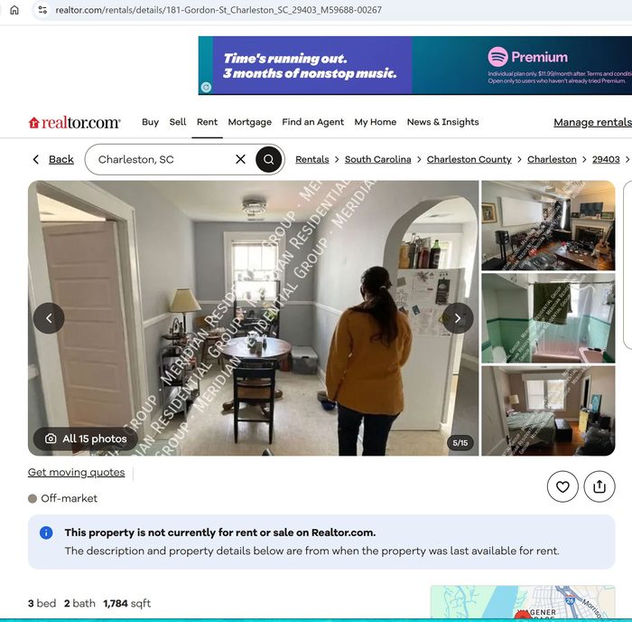 The page as filed with the Court of Common Pleas: a full-color capture of the Realtor.com listing in which a person with dark hair, wearing a mustard-gold garment, stands at the center of the photograph.
